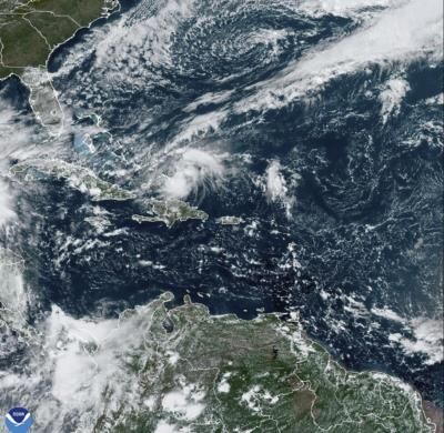 Hurricane Oscar Forms Off Bahamas, Tropical Storm Nadine Inland