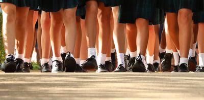 Why do some schools still force girls to wear skirts or dresses?