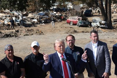 Smiling Trump Shows Off McDonald's 'French Fry Certification Pin' During Hurricane Relief Press Conference