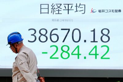 Stock market today: Asian shares fall after Wall Street pulls back from its records