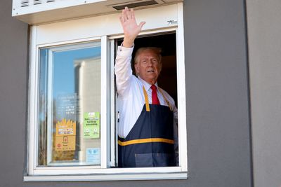 Smiling Trump Shows Off McDonald's 'French Fry Certification Pin' During Hurricane Relief Press Conference