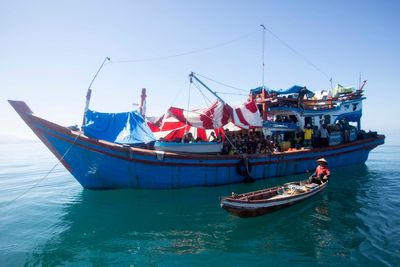 About 140 Rohingya Muslims on wooden boat off Indonesia's coast as residents refuse to let them land