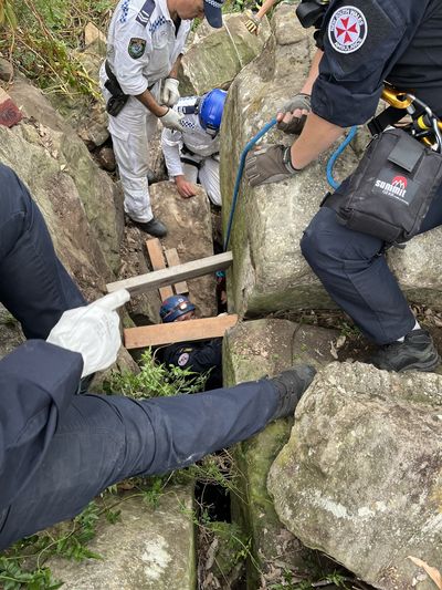 Woman Ends Up Stuck Upside Down Between Two Massive Boulders for Hours After Chasing Dropped Phone Down a Hole