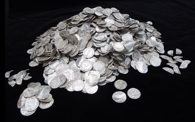 Norman coin hoard becomes England’s most valuable treasure find after being sold for record-breaking sum