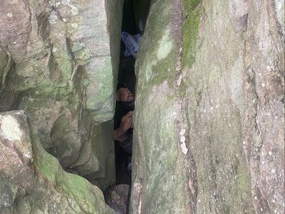 Woman spends seven hours hanging upside down between boulders after trying to retrieve phone