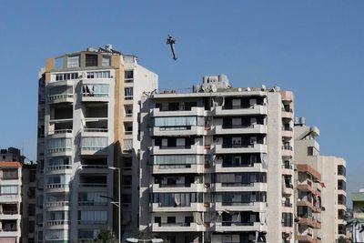 AP PHOTOS: Images capture exact moments an Israeli missile strikes building in Beirut