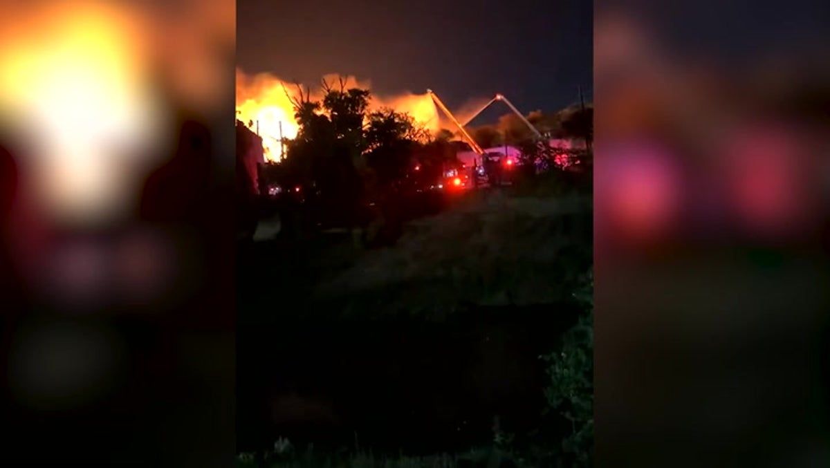 Huge pallet fire breaks out near Dallas Love Field…