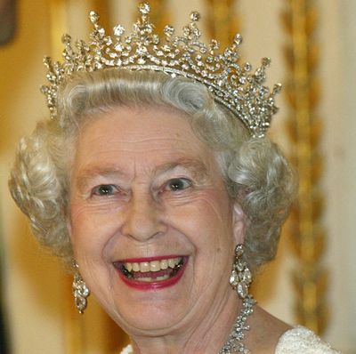 Why Queen Elizabeth Ended up on a "Water Shoot Slide" in an “Evening Dress and Tiara"