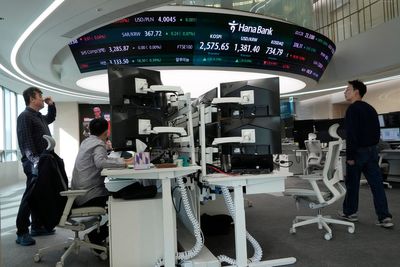 Asian stocks are mixed following a quiet day on Wall Street