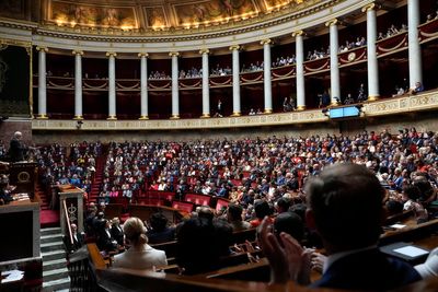 French legislators divided over a lawmaker caught buying drugs