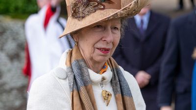 Princess Anne was the epitome of cosy elegance in snowy white coat and suede knee high boots for family outing