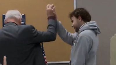 Tim Walz’s son receives huge cheer as he votes for first time in US election