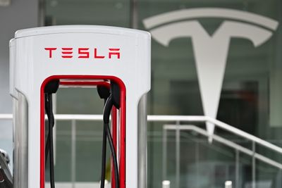 Tesla Shares Jump As Profits Rise On Lower Expenses