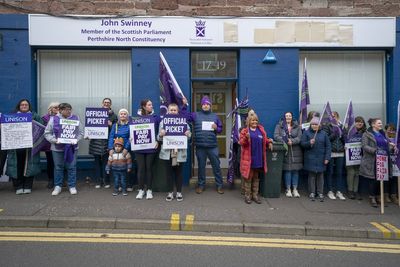 Striking council staff stage pay protest outside Swinney’s office