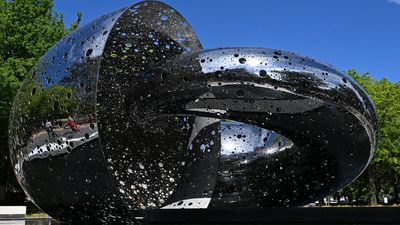 Holey moley! Massive Ouroboros sculpture eats limelight