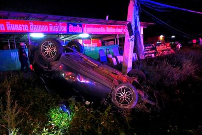 Driver thrown from car after hitting power pole