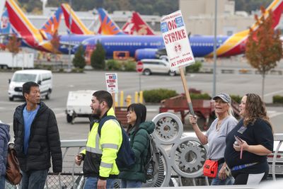 Boeing workers vote to reject wage deal, extend strike