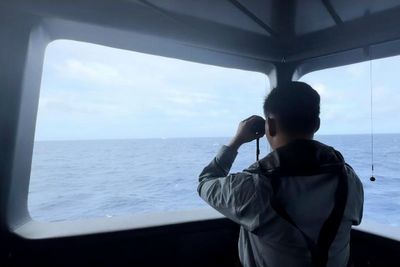 Indonesia says its coast guard drove away Chinese ship that interrupted survey in disputed sea