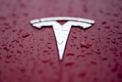 Tesla reports better than expected profit, sending shares higher