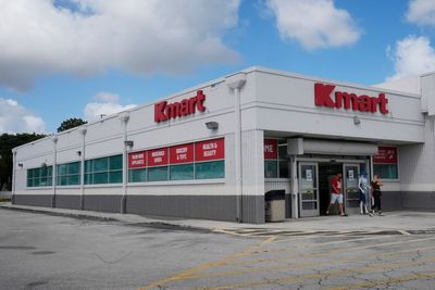 In a suburban Miami shopping center, Kmart's last 'Blue Light Specials' flicker