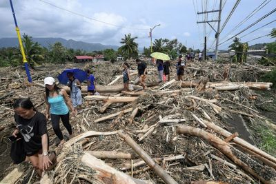 Tropical Storm Leaves Towns Submerged, 76 Dead In Philippines