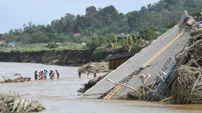 Philippine Rescuers Battle Floodwaters To Reach Stranded