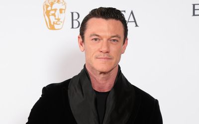 Luke Evans says parents were told to stop talking to him after he came out as gay: ‘It was painful’