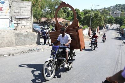 Gang coalition in Haiti spreads violence to Port-au-Prince neighborhood, setting fire to homes