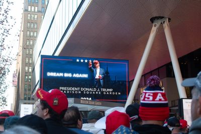 I was with Trump fans that flooded the streets outside MSG with red hats. The scenes were weird even for NYC