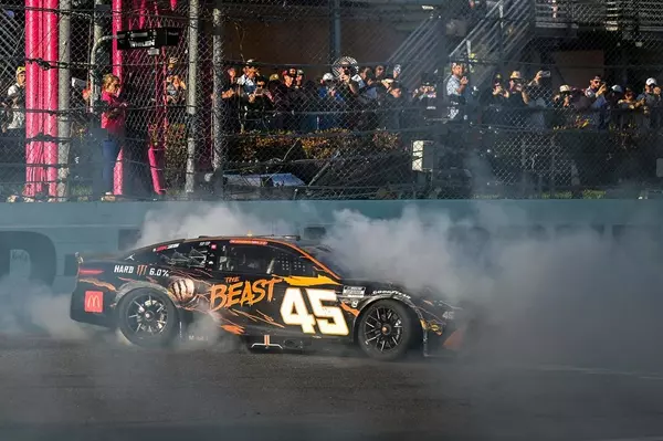 Tyler Reddick wins his way into championship race with wild last-lap pass