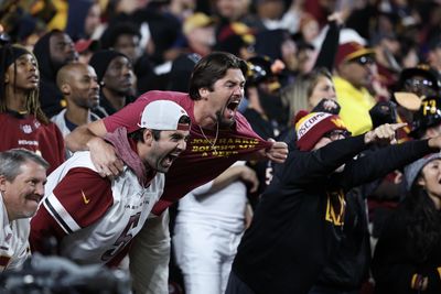 Commanders’ Trent Scott flattens celebrating fan with chest bump