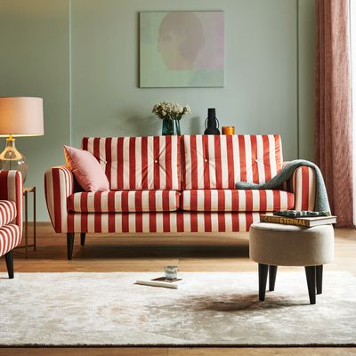 Experts say this timeless pattern is the next big upholstery trend – here's how to style it in your living room