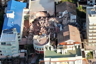 Ten-storey hotel collapse in Argentina leaves one dead and several trapped