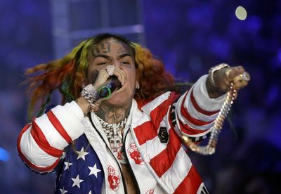 Rapper Tekashi 6ix9ine is arrested in New York for a possible parole violation