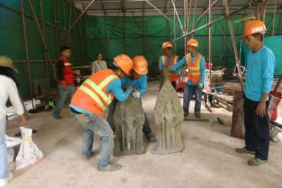 Ancient Door Guardian Statues Unearthed At Angkor World Heritage Site