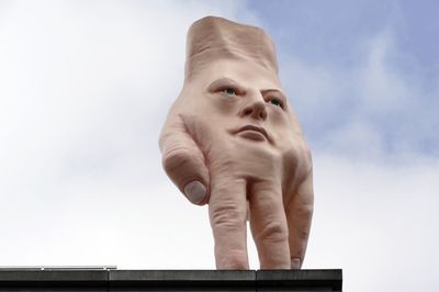 'Cursed' Statue Removed from City Roof After Years of Controversy: 'He's Going to The Hague'