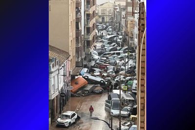 Viral Photo Shows Dozens of Cars Piled On Top of One Another After 'Unprecedented' Flood: 'Looks Like Something Out of a Godzilla Movie'