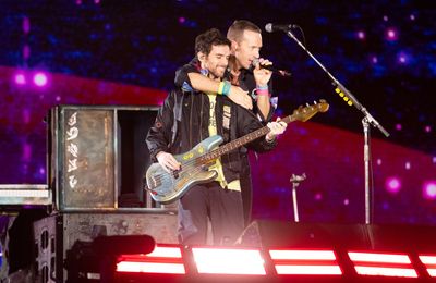 Coldplay play first concert without bassist Guy Berryman after he was 'taken ill'