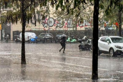 Is it safe to travel to Spain and should I cancel my holiday after flooding disaster?