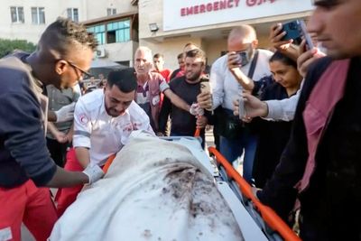 Gaza medic discovers he's carrying his own mother's body after Israeli airstrike