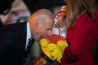 Joe Biden bites baby while wife Jill dresses as panda to celebrate Halloween