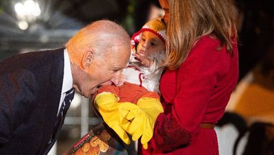 Watch: Joe Biden bites baby during White House Halloween party