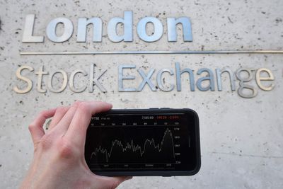 Global stocks tumble and pound weakens as investors digest UK Budget