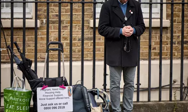 Anti-abortion activists set up outside clinic ‘safe zones’ on first day of new law in England