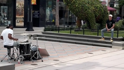 Who's gonna tell him? Busker drums Red Hot Chili Peppers song without realising drummer Chad Smith was watching