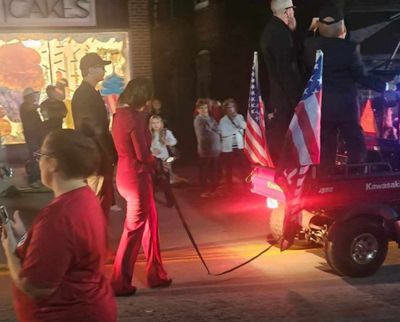 Shocking Pennsylvania Halloween Parade Features Kamala Harris in Chains Pulled by Trump in Golf Cart