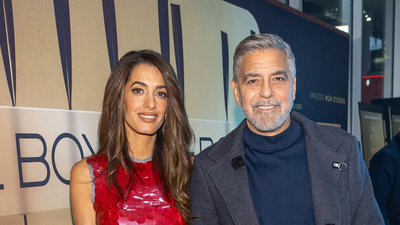 Amal Clooney's claret-coloured jumpsuit is the polished way to try the burgundy trend this season