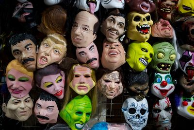 In cartel-plagued Mexican cities authorities warn adults not to wear masks on Halloween