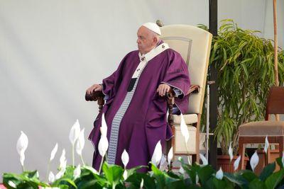 Pope Francis prays in front of graves of unborn children ahead of All Souls' Day Mass