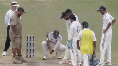 Mukesh Kumar assists groundsman with pitch repairs during IND-A vs AUS-A 'unofficial' Test. WATCH